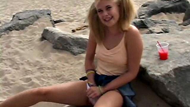 Little Summer fingering her pussy at the beach
