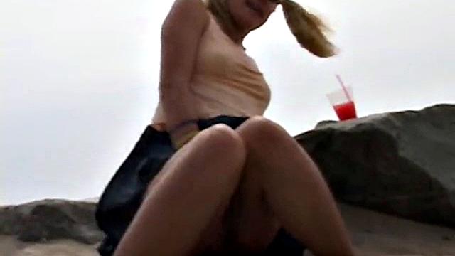 Little Summer fingering her pussy at the beach