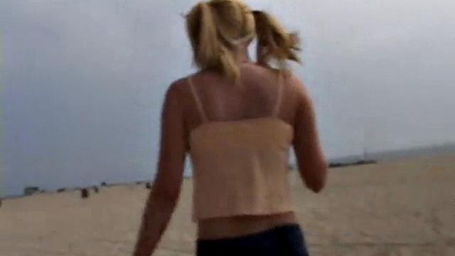 Little Summer fingering her pussy at the beach