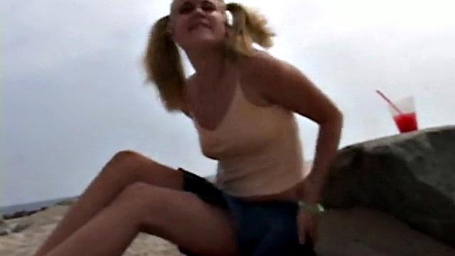 Little Summer fingering her pussy at the beach