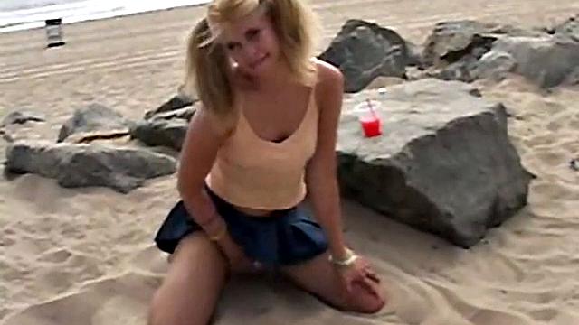 Little Summer fingering her pussy at the beach