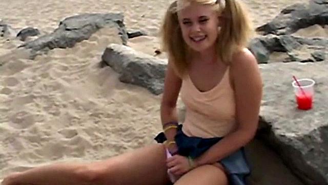 Little Summer fingering her pussy at the beach