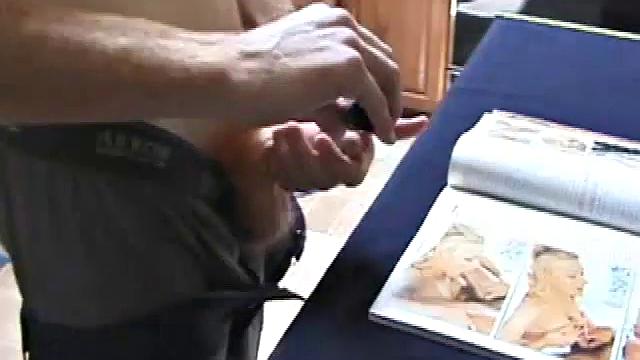 Always horny red haired skater covers the kitchen table with a large towel, stretches out a tape measure the length of the table, grabs a porn magazine, removes his shirt, and gets right down to business.