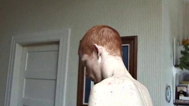Always horny red haired skater covers the kitchen table with a large towel, stretches out a tape measure the length of the table, grabs a porn magazine, removes his shirt, and gets right down to business.