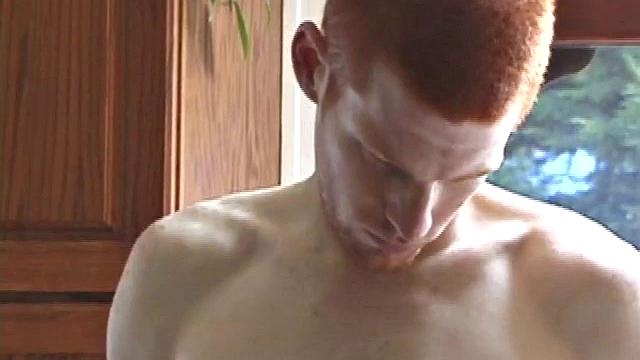 Always horny red haired skater covers the kitchen table with a large towel, stretches out a tape measure the length of the table, grabs a porn magazine, removes his shirt, and gets right down to business.