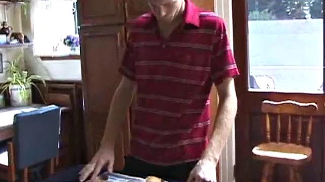 Always horny red haired skater covers the kitchen table with a large towel, stretches out a tape measure the length of the table, grabs a porn magazine, removes his shirt, and gets right down to business.