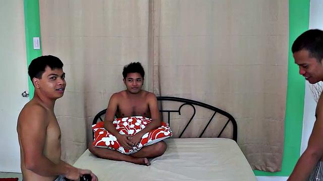 A brand new ticklish Asian twink has joined our den of tickling. His name is Evo and he was surely a lively one! He's got really cute feet, and so ticklish! So Alex and Vahn strapped him down spreadeagled on the bed and tickled him.