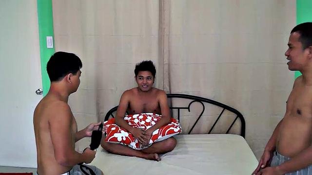 A brand new ticklish Asian twink has joined our den of tickling. His name is Evo and he was surely a lively one! He's got really cute feet, and so ticklish! So Alex and Vahn strapped him down spreadeagled on the bed and tickled him.