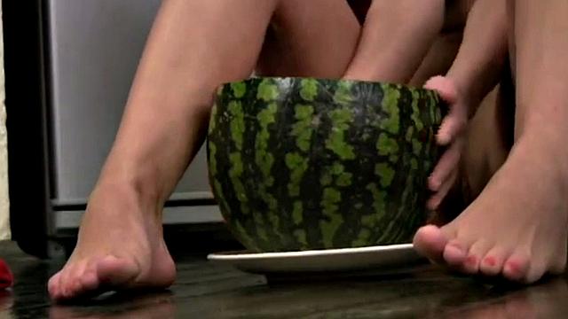 Cute Christina squashing a watermelon