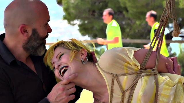 Femsub used in public suspension with spanking