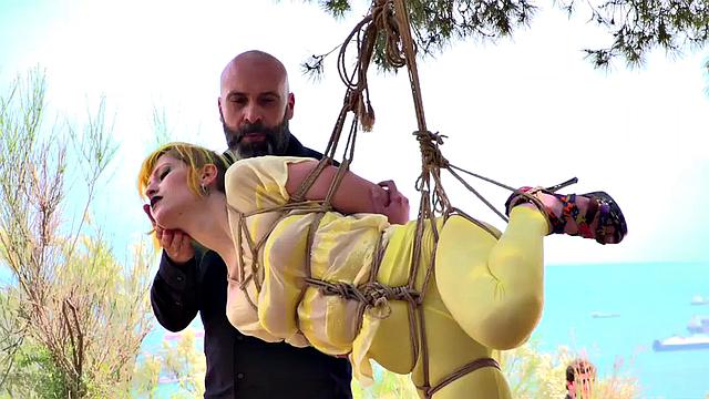 Femsub used in public suspension with spanking