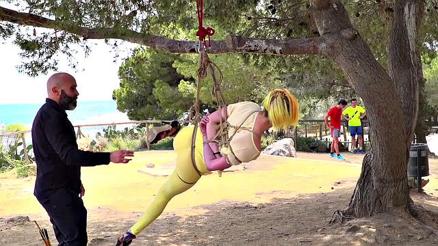 Femsub used in public suspension with spanking