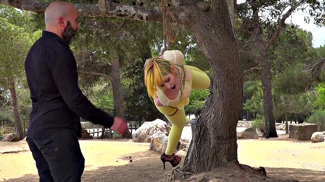 Femsub used in public suspension with spanking