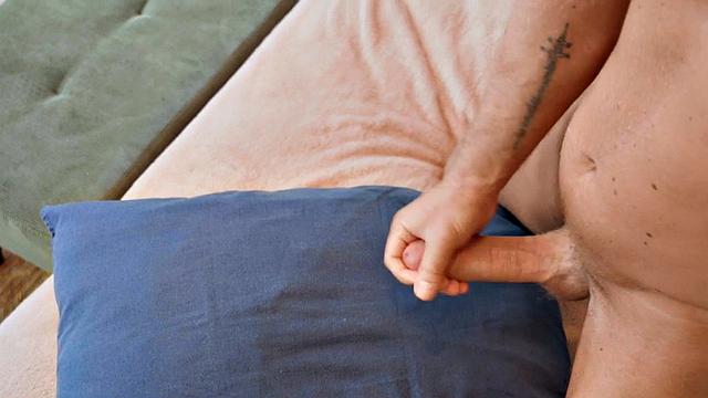 Ripped stag jerks off