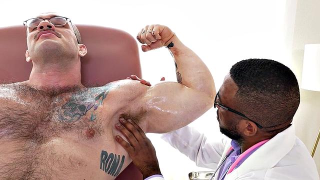 Black doctor with muscle fetish gives HJ to big patient