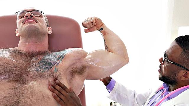 Black doctor with muscle fetish gives HJ to big patient