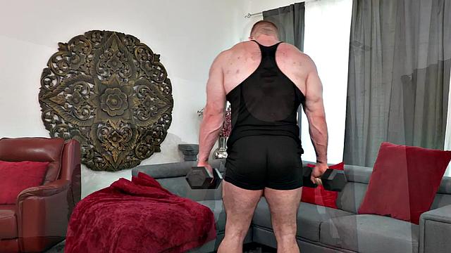 Black doctor with muscle fetish gives HJ to big patient