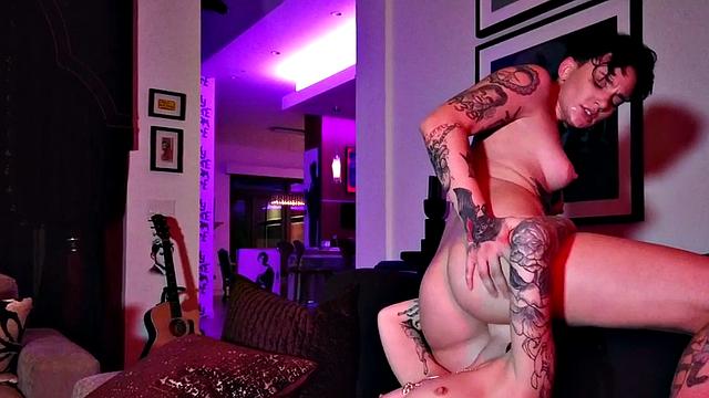 Tattooed girlfriend faceriding her girlfriend in stockings while enjoying a steamy inside-out session