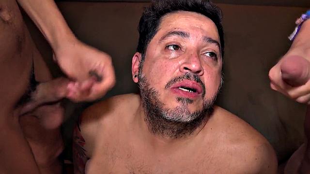 Chubby DILF barebacked in 3way by Latino twinks