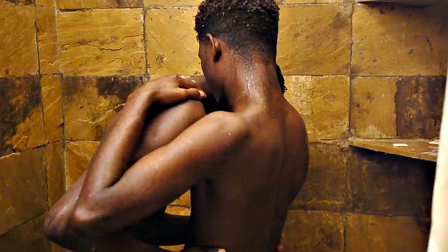 Sucking black twink from behind in erotic action