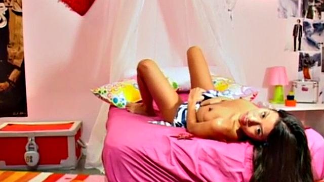 Latina teen toys her tight pussy