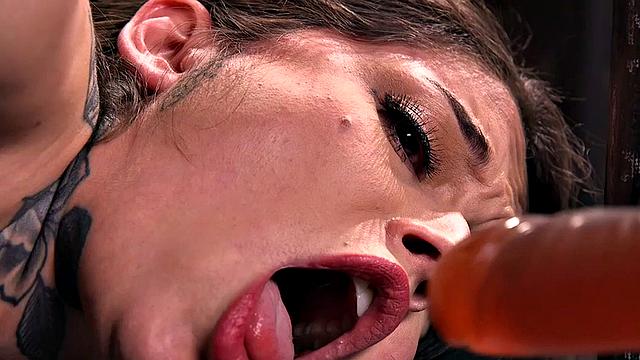 BDSM sub suffers in waxplay session after dildo throat