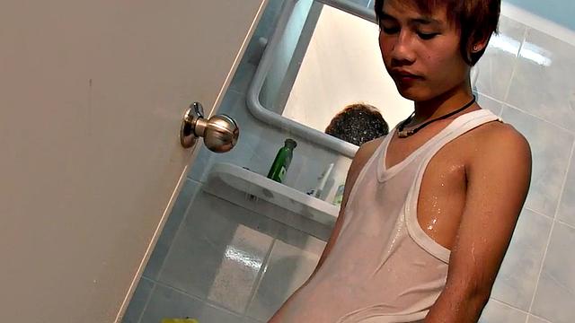 Peeing Nippon twink masturbates at home after shower