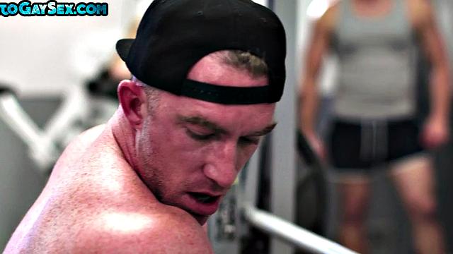 Public gym stud barebacked by athletic top workout
