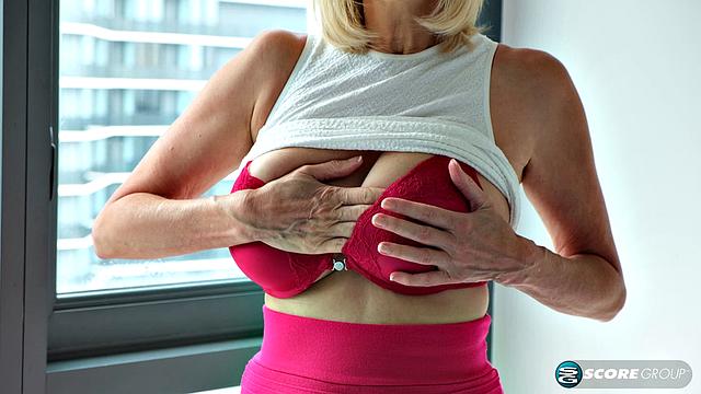 The big-titted 60Plus MILF (and wife) is named Morgan Shipley