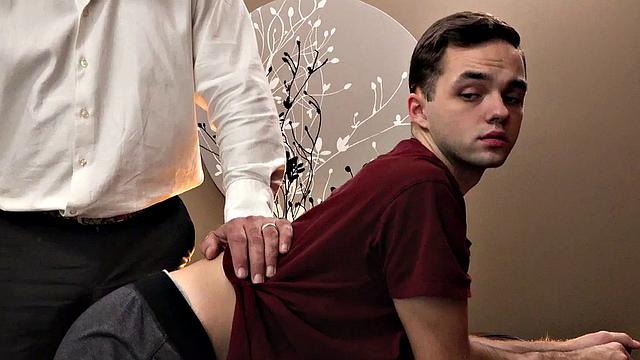Skinny twink spanked in office by DILF while toying his ass