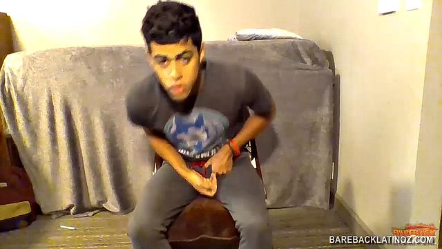 Our featured solo boy of the week is Roberto Sanz, a droopy eyed Latin boy, who almost looks bored as he strips out of his pants and underwear to reveal his uncut cock.