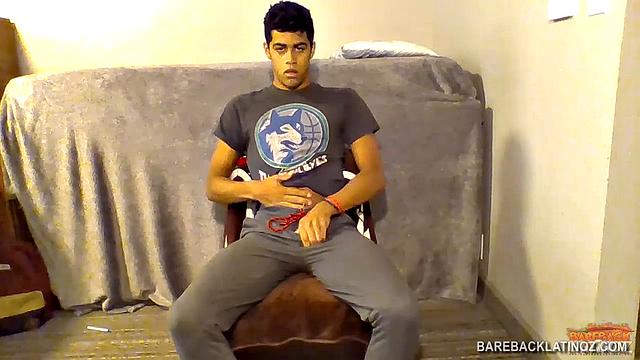 Our featured solo boy of the week is Roberto Sanz, a droopy eyed Latin boy, who almost looks bored as he strips out of his pants and underwear to reveal his uncut cock.