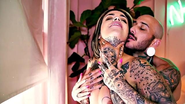 Pussylicked TS fellow with tattooed body fucks babe
