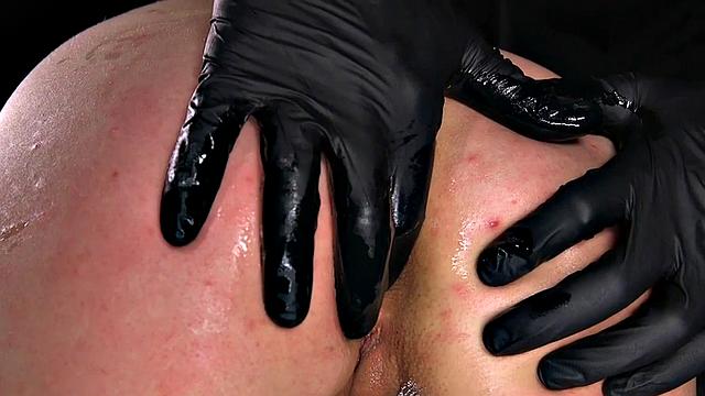 BDSM Asian sub pissing while toyed with dildostick