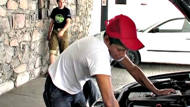 Alex finds his friends doing some car repairs and suggests they take a break. The trio moves indoors, where the horny bottom soon has Oscar and Sergio watching porn.