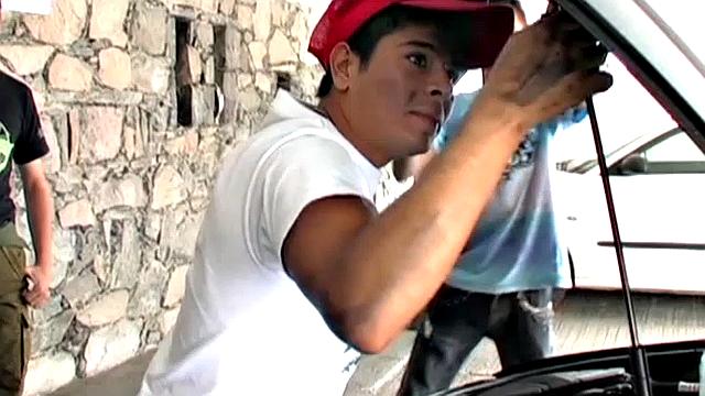 Alex finds his friends doing some car repairs and suggests they take a break. The trio moves indoors, where the horny bottom soon has Oscar and Sergio watching porn.