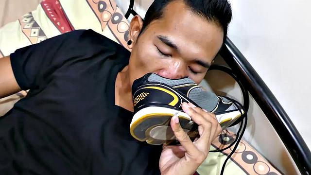 This smooth slim Asian twink loves the smell of his socks and shoes after a long day at work. He's horny for the sweet aroma of his sweaty feet, so he starts his foot fetish solo action.