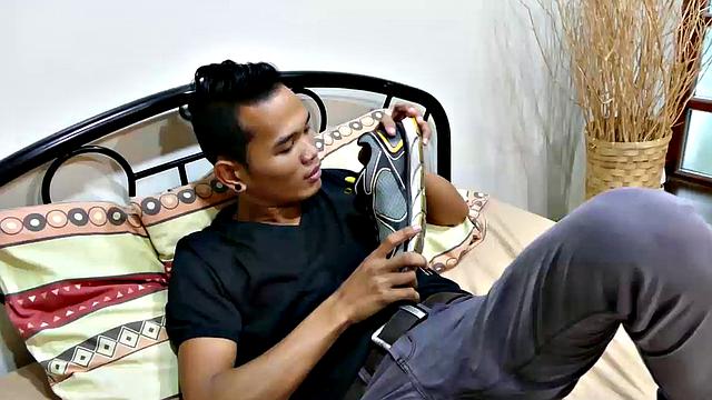 This smooth slim Asian twink loves the smell of his socks and shoes after a long day at work. He's horny for the sweet aroma of his sweaty feet, so he starts his foot fetish solo action.