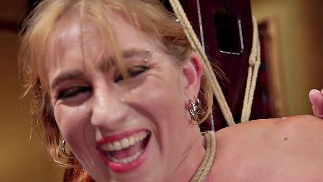 Blonde babe tied up and toyed in public while enjoying kinky sex-toys