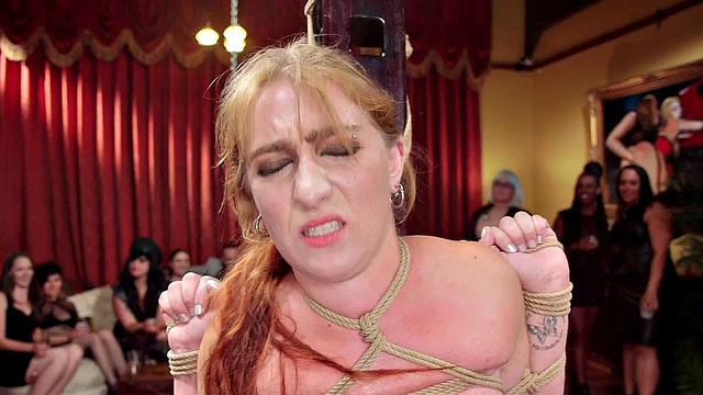 Blonde babe tied up and toyed in public while enjoying kinky sex-toys