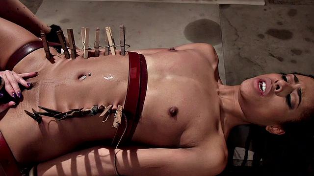Clothespinned Ebony sub suffers in lezdom BDSM