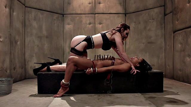 Clothespinned Ebony sub suffers in lezdom BDSM