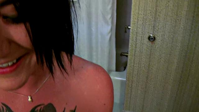 Anderson's tattooed pussy gets a deep pussy pounding in the bathroom