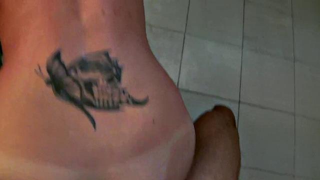 Anderson's tattooed pussy gets a deep pussy pounding in the bathroom