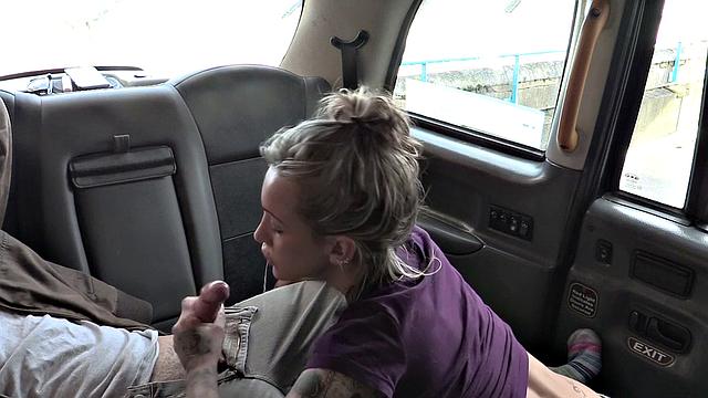 Tattooed babe gets her ass drilled deep in a car backseat
