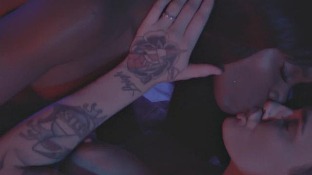 Ebony babe strapon fucked by tattooed GF after licking