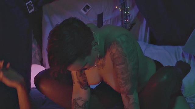 Ebony babe strapon fucked by tattooed GF after licking