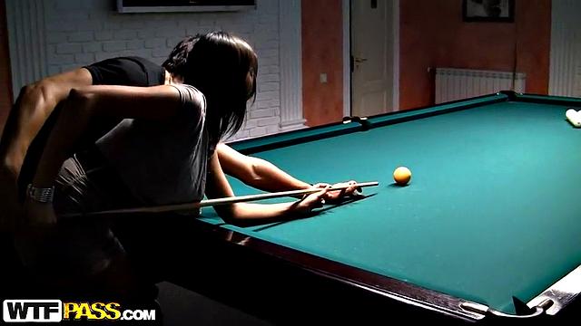 Billiard scene with pick up girl