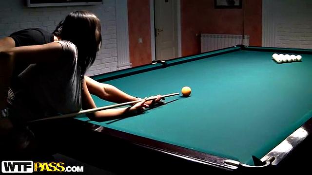 Billiard scene with pick up girl