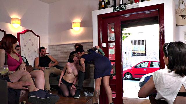 A tattooed slut get down and dirty with her toes and balls in public